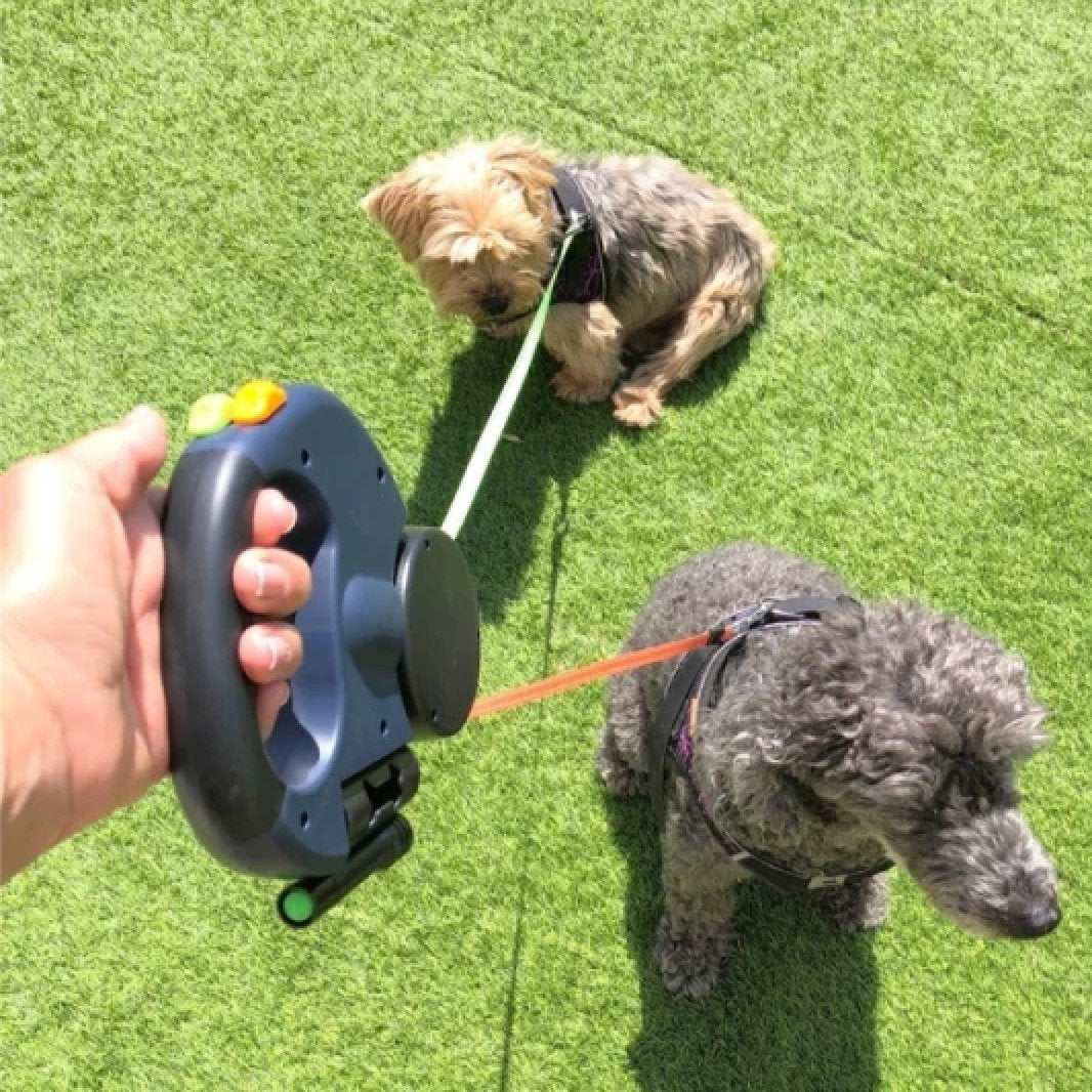 Dual Retractable Dog Leash with Flashlight & Waste Bag Holder